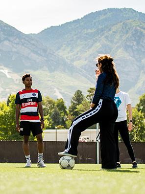 Coach talking to soccer players