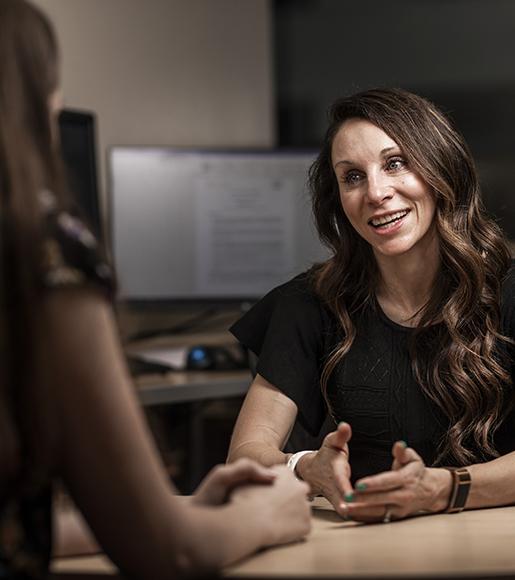 Woman advising a female student